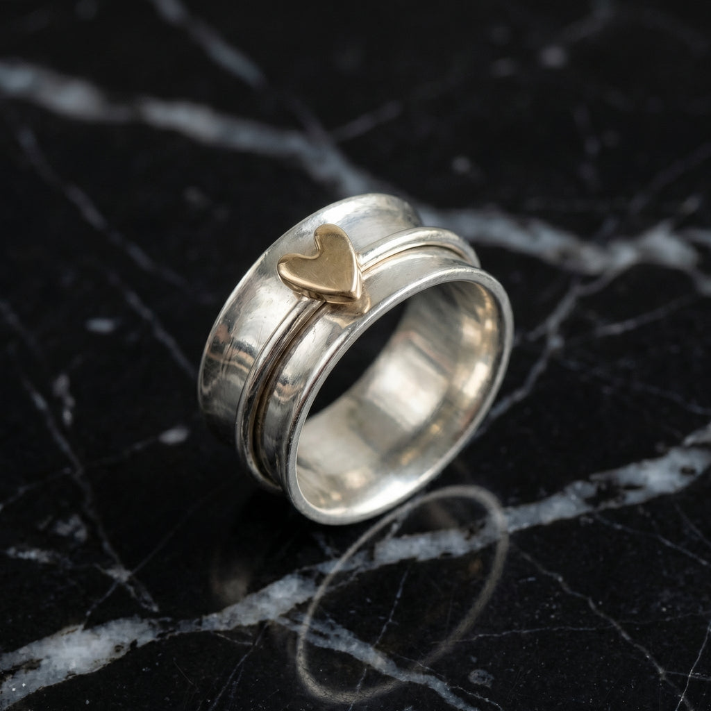 Elisa - Anillo plateado con corazón dorado